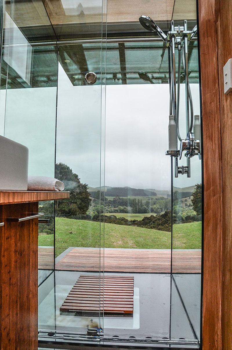 You can hike to and stay in a secluded glass hotel room in the middle of a valley in New Zealand.