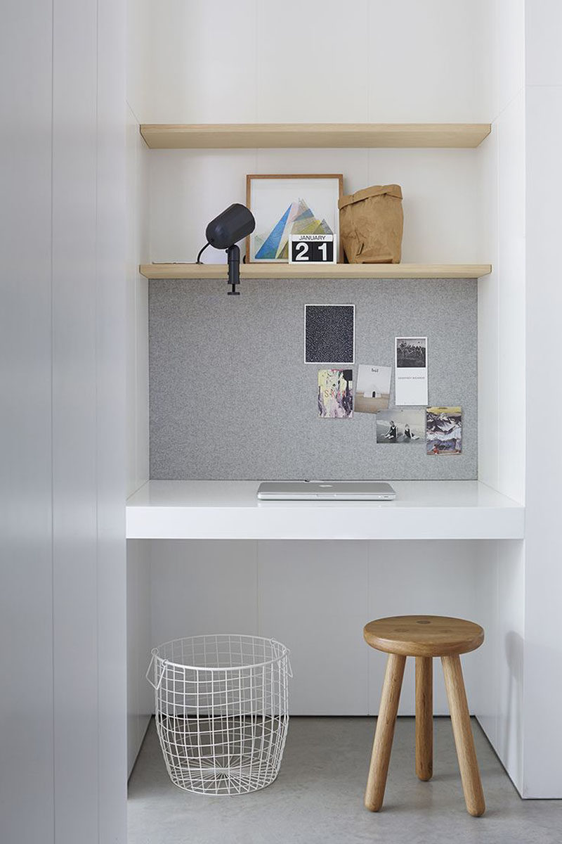 10 Small Home Office Ideas - Lining part of the wall of the alcove with a surface you can attach things to, like a bulletin board or a magnetic board, gives you a spot to stick photos, notes, and reminders to so you've always got inspiration around you while you work. #HomeOffice #SmallHomeOffice #SmallDesk #InteriorDesign