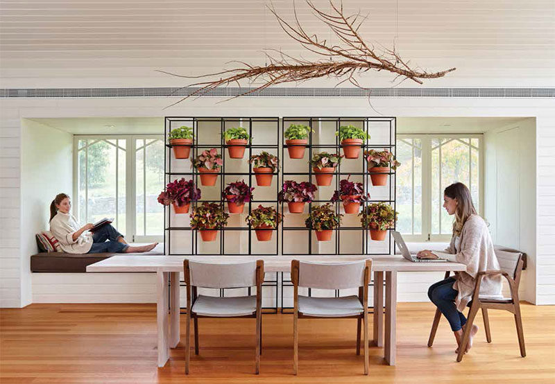 This standalone room divider is perfect for creating a vertical garden.