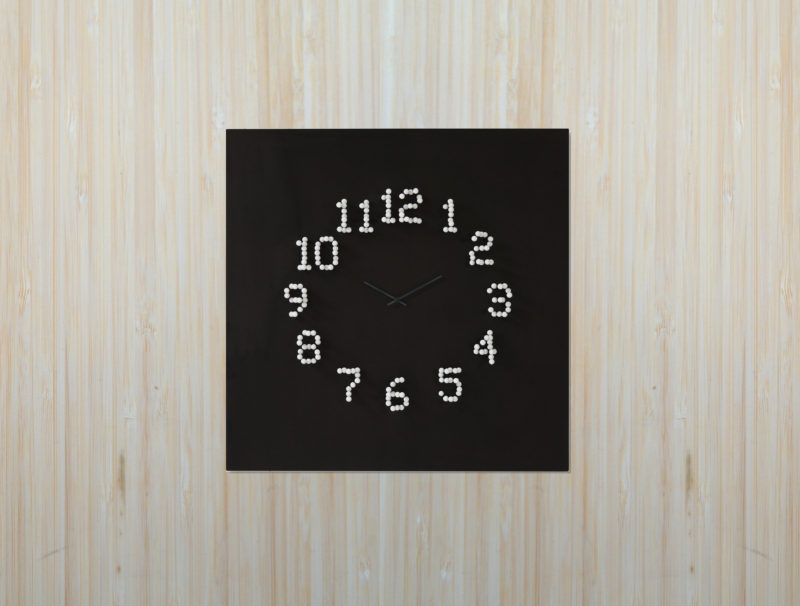 When you move around this clock, for example side to side, the numbers dissolve and transform into different shapes, resulting in an optical illusion and making the clock appear more as a piece of art than a device to tell time.