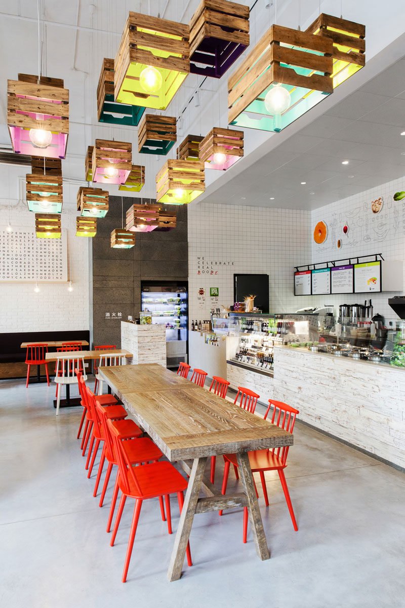 Lighting Design Idea - Painted wooden crates have been used to create pendant lighting in this restaurant.