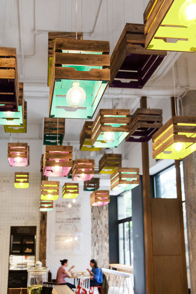 Lighting Design Idea - Painted wooden crates have been used to create pendant lighting in this restaurant.