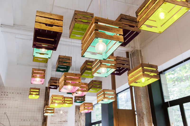 Lighting Design Idea - Painted wooden crates have been used to create pendant lighting in this restaurant.