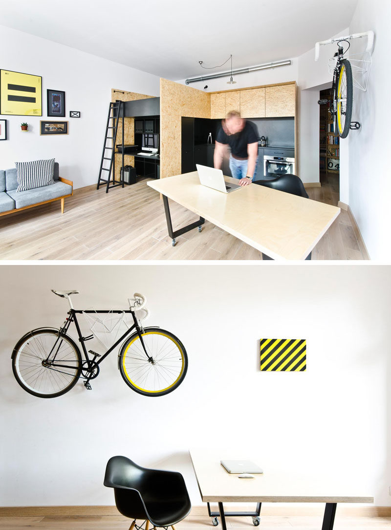 This small apartment has been designed as a live/work space for a design studio.