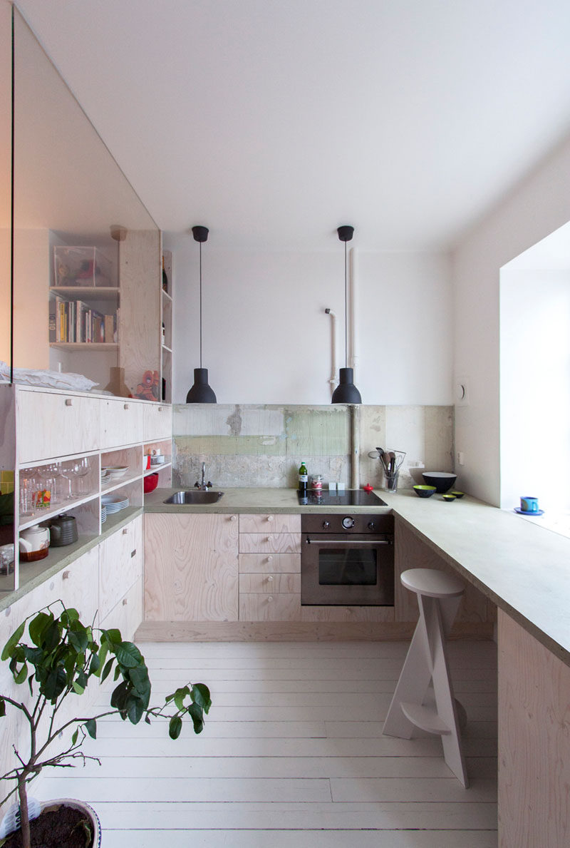 This 387 square foot (36 sqm) apartment was used as a furniture storage room for 30 years, before it was updated with a loft bed and plenty of storage.