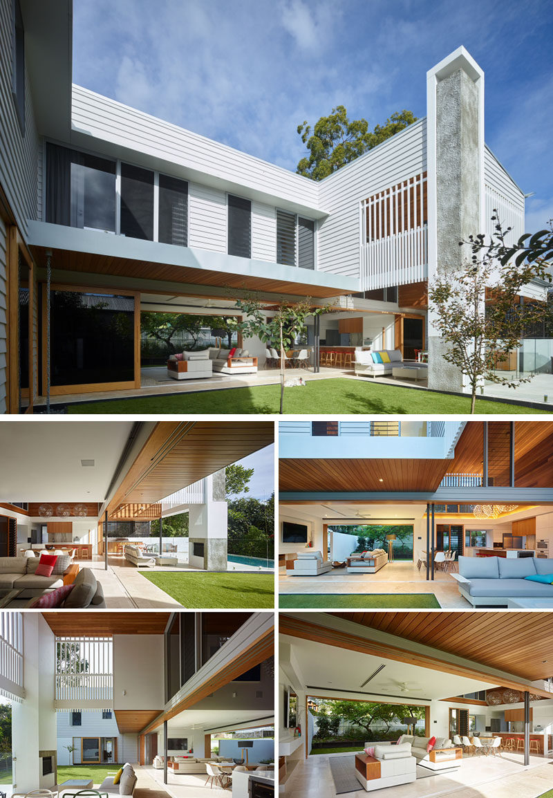 23 Awesome Australian Homes That Perfect Indoor / Outdoor Living // Massive sliding glass doors can be opened to connect the bottom level of the house with the outdoor entertaining area that includes a fireplace, lounge, dining area, backyard, and pool.