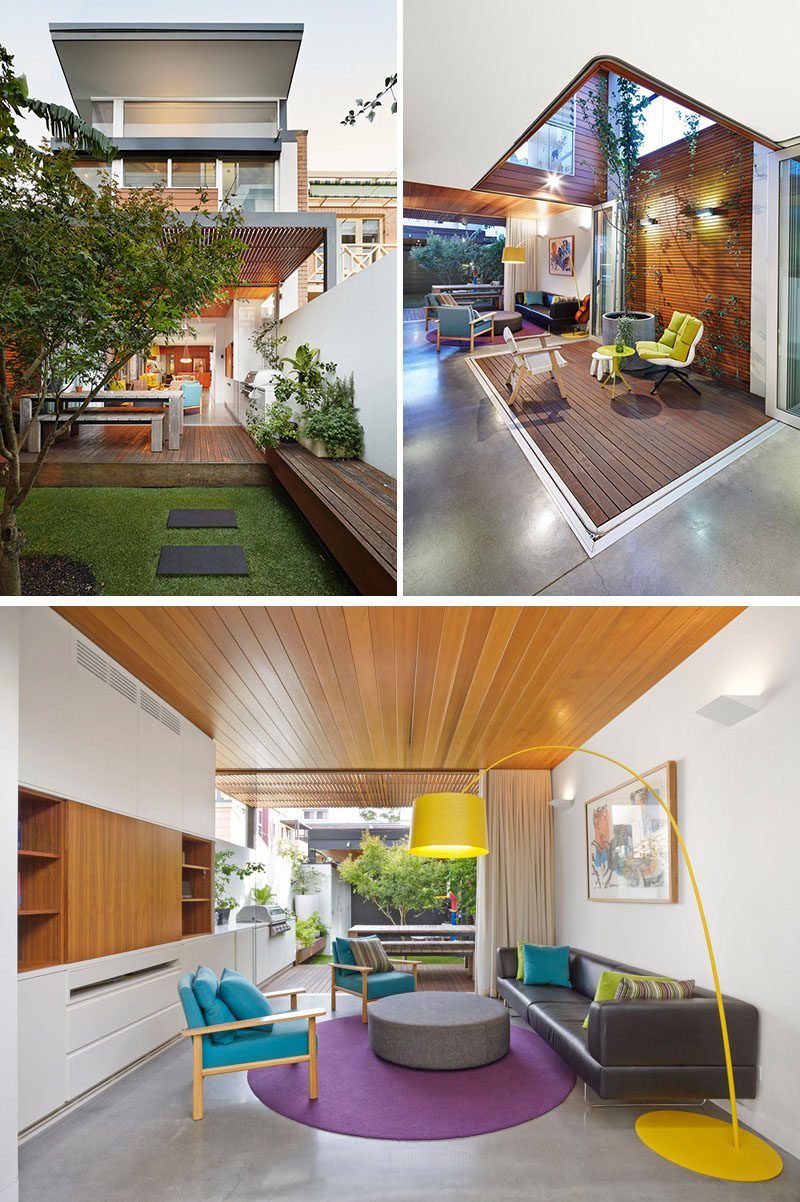 23 Awesome Australian Homes That Perfect Indoor / Outdoor Living // The back of this home opens up into the backyard and has cabinetry that extends from the indoor entertainment unit onto the deck, that houses a large built-in barbeque. Other areas of the home are also connected to the outdoors with folding glass doors that open up onto patios right inside the home.