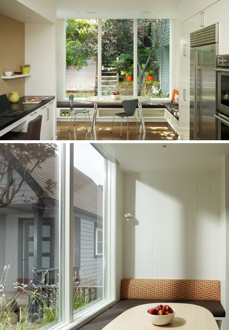 Dining Room Design Ideas - Use Built-In Banquette Seating To Save Space // This corner breakfast nook has banquette seating with upholstered cushions and is super bright thanks to the large windows looking out on to the backyard.