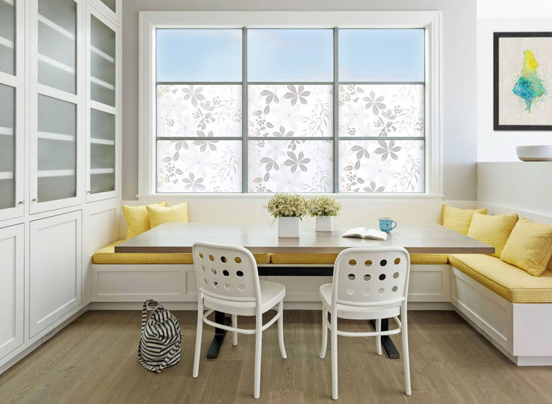 Dining Room Design Ideas - Use Built-In Banquette Seating To Save Space // Bright yellow upholstery and cushions used to soften the banquette brighten this mostly-white corner dining area.