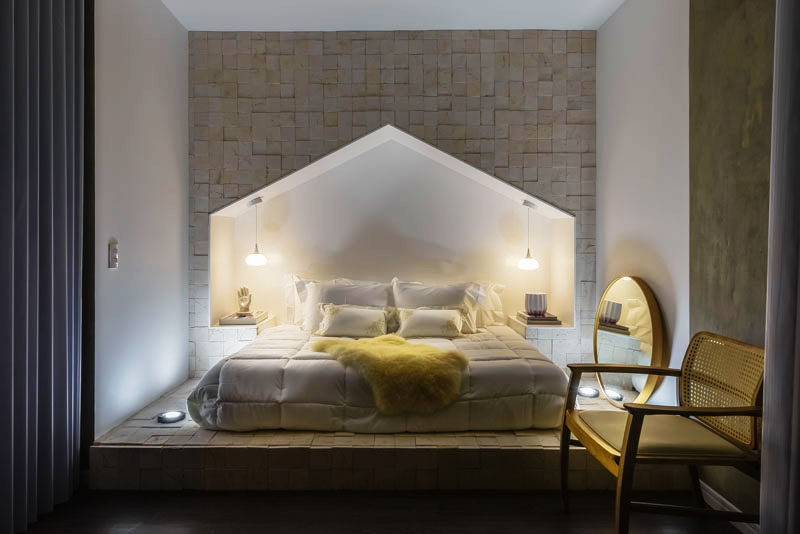 Bedroom Design Idea - This bed surround is shaped like a house with a peaked roof