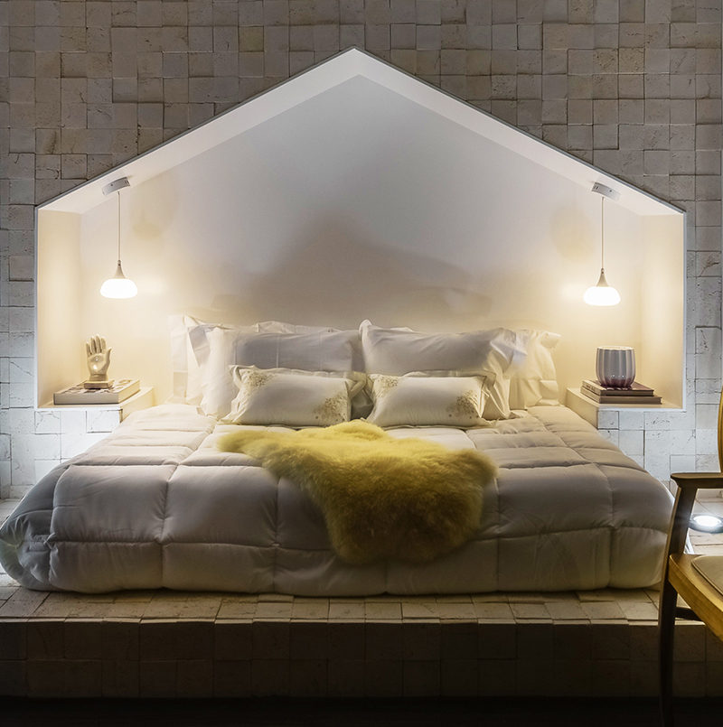 Bedroom Design Idea - This bed surround is shaped like a house with a peaked roof