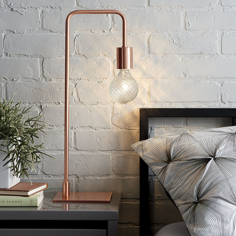 12 Bedside Table Lamps To Dress Up Your Bedroom // Arc Copper table lamp from CB2