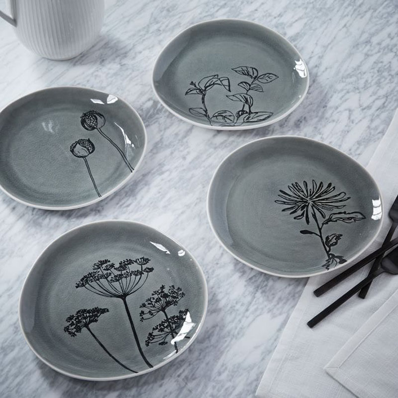 17 Ways To Introduce Botanical Designs Into Your Home Decor // These plates are a super subtle way to add some botanicals to your table.