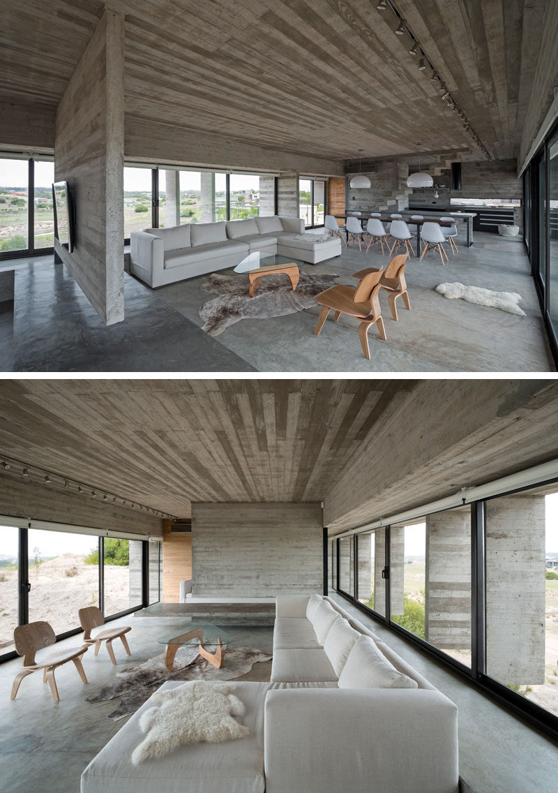 23 Pictures That Show How Concrete Floors Have been Used Throughout Homes // Concrete in the living room may sound cold and uninviting but if it's layered with blankets, pillows, and comfy cushions, the opposite ends up being true.