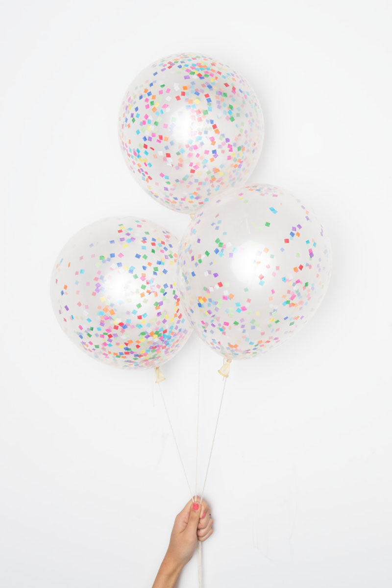 5 Essentials You Need When Hosting An Awesome Modern Tea Party // Confetti-filled balloons bring color and fun to the party and give a youthful feel to the gathering.