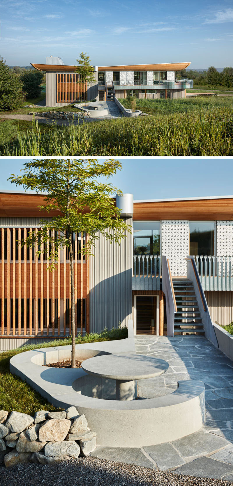 At the front of this home in Germany, there's a built-in curved concrete seating area with table.