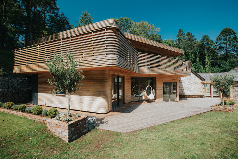 British designer-maker Tom Raffield, has completed a home for himself and his family, that features steam bent wood, just like his lighting and furniture designs.