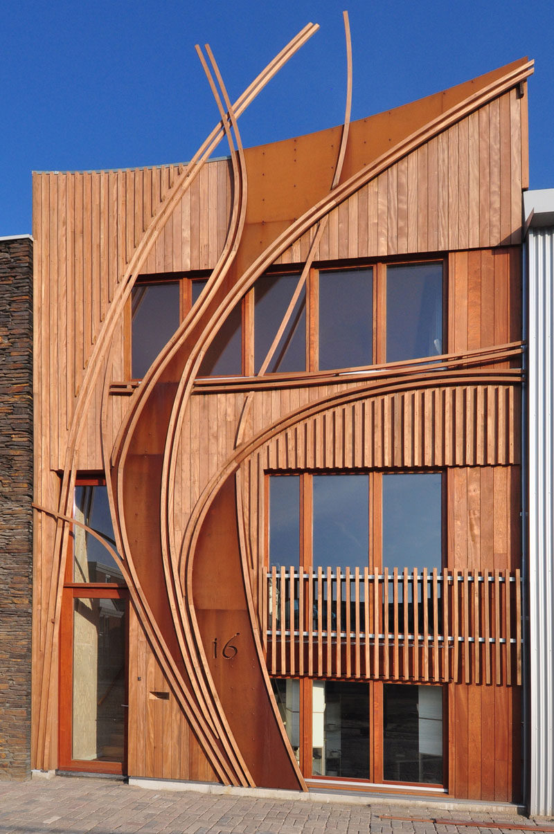 Exterior Design Ideas - 15 Buildings That Have Unique And Creative Facades // Curved weathering steel is worked into the rest of the wood-clad exterior of this home.