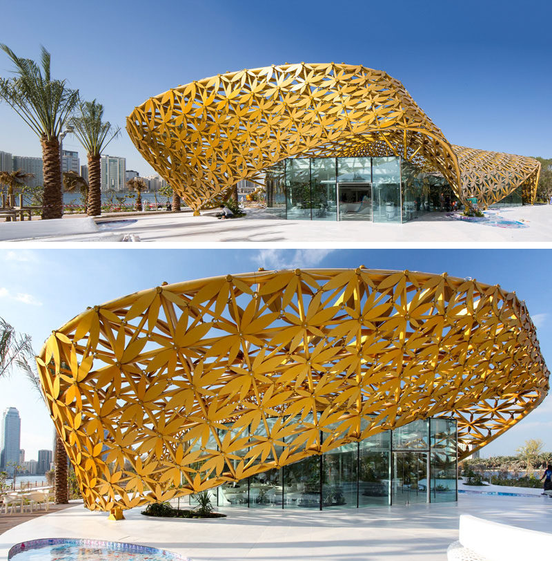 Exterior Design Ideas - 15 Buildings That Have Unique And Creative Facades // The exterior of this public building is covered with a shell of bright yellow metal flowers.