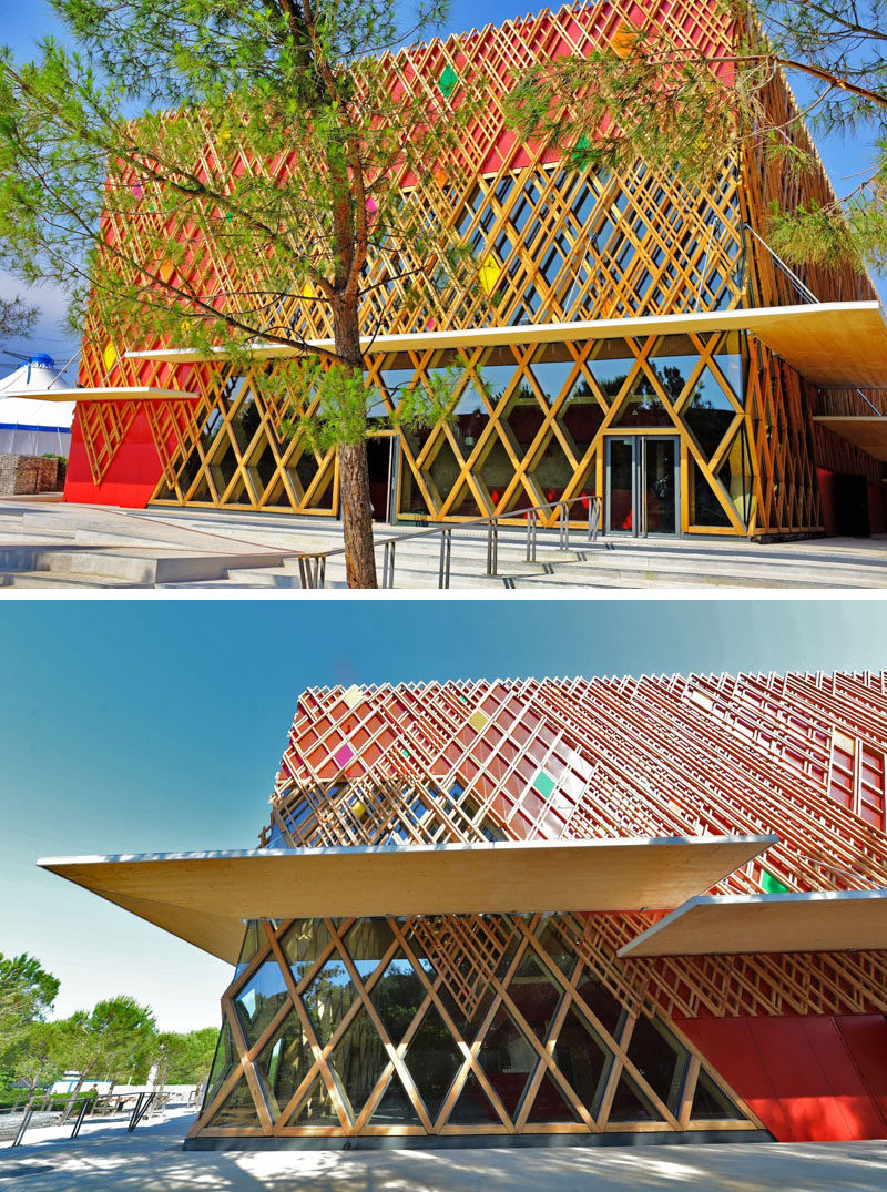 Exterior Design Ideas - 15 Buildings That Have Unique And Creative Facades // The exterior of this theatre is covered by a lattice-like grid pattern with pops of color scattered throughout it.