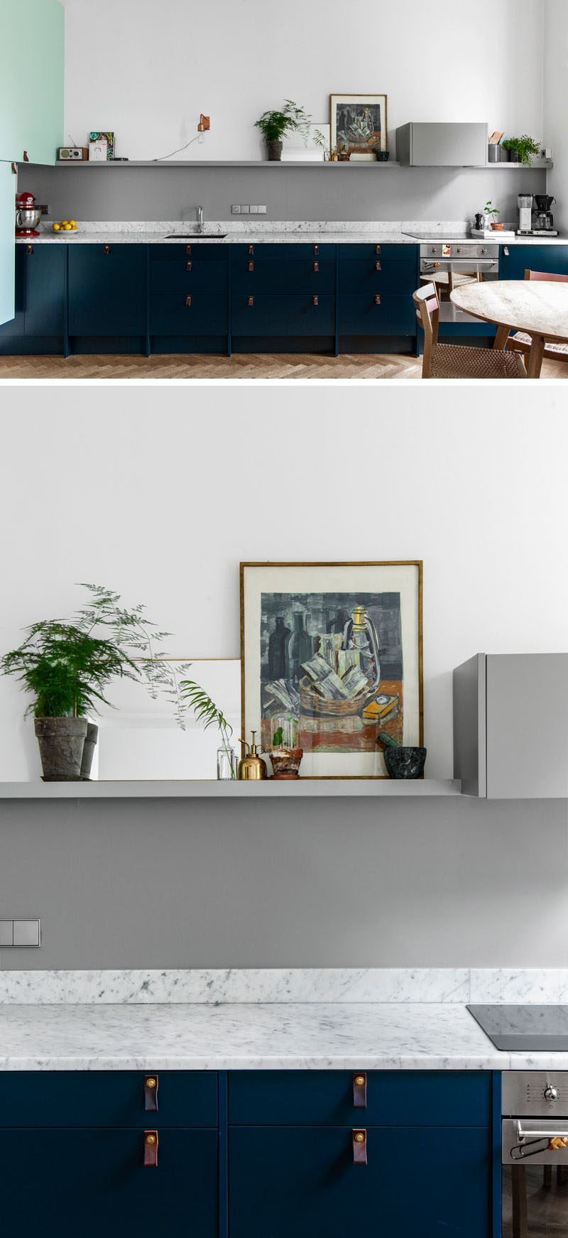 Kitchen Design Ideas - Deep Blue Kitchens // Dark blue cabinets with dark leather pulls and marble countertops give this kitchen a sophisticated Scandinavian feel.