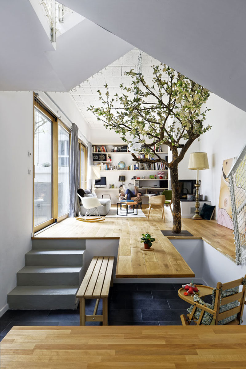 Interior Design Ideas - The floor of this living room extends and becomes a cantilevered dining table