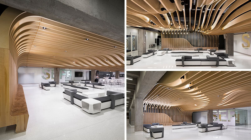 Interior Design Ideas - The wooden seating in this student center continues up the wall and becomes the ceiling.