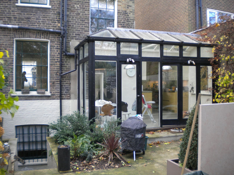 This leaky and cold conservatory was updated with a modern black extension. Click through to see the new extension.