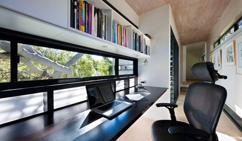 Interior Design Idea - 13 Examples Of Desks In Hallways // A long desk running the length of the window provides a perfect spot to study or work from, and has a nice view to help keep you inspired.