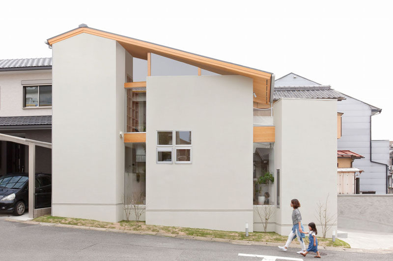 This house in Japan has a built-in, lofted hang-out net for the children to relax in.