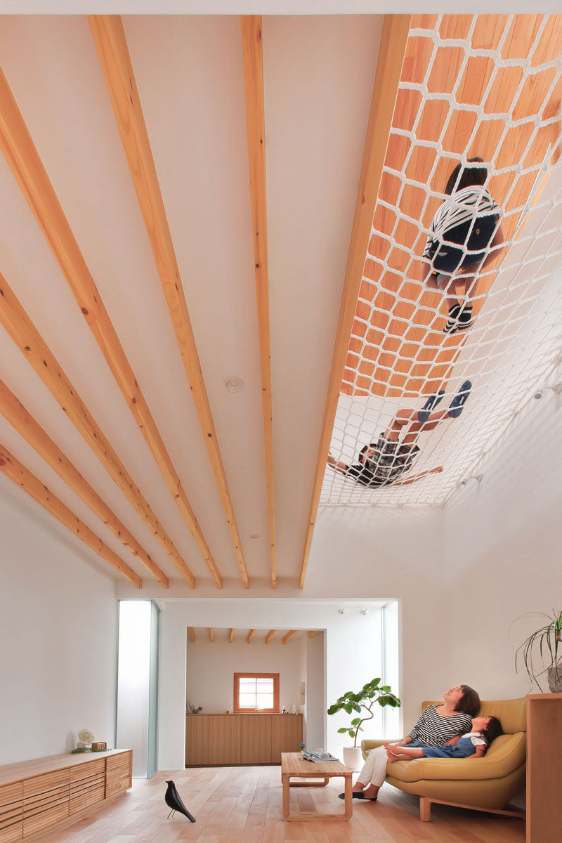 This house in Japan has a built-in, lofted hang-out net for the children to relax in.