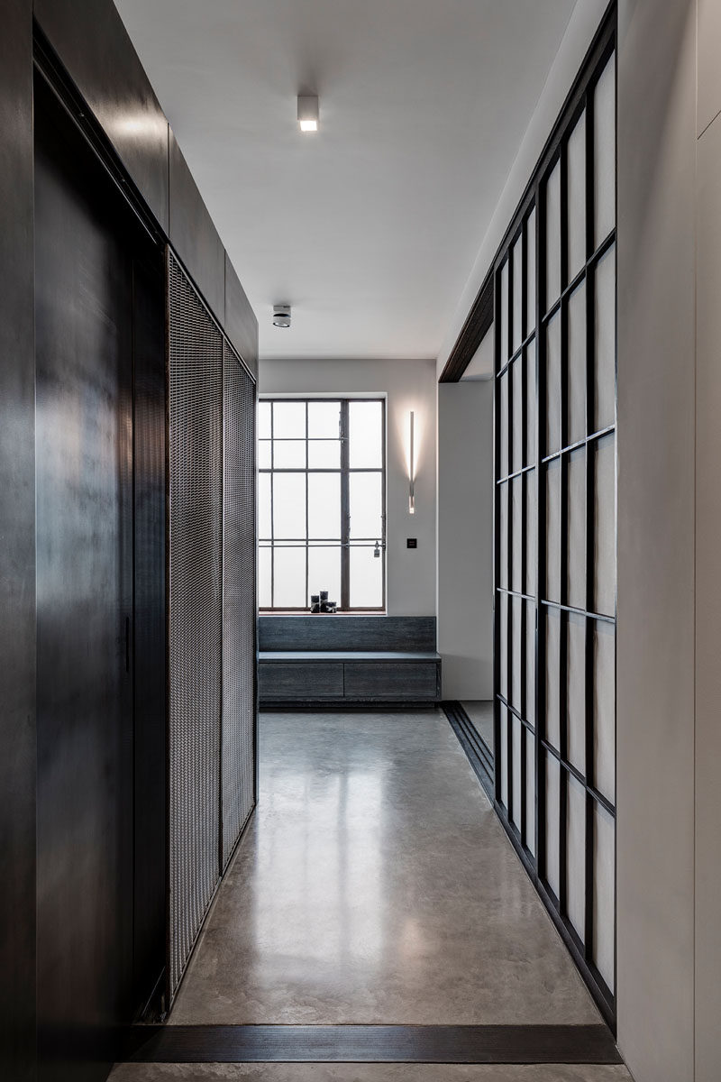 This apartment's industrial interior was inspired by the old factory space it was built in