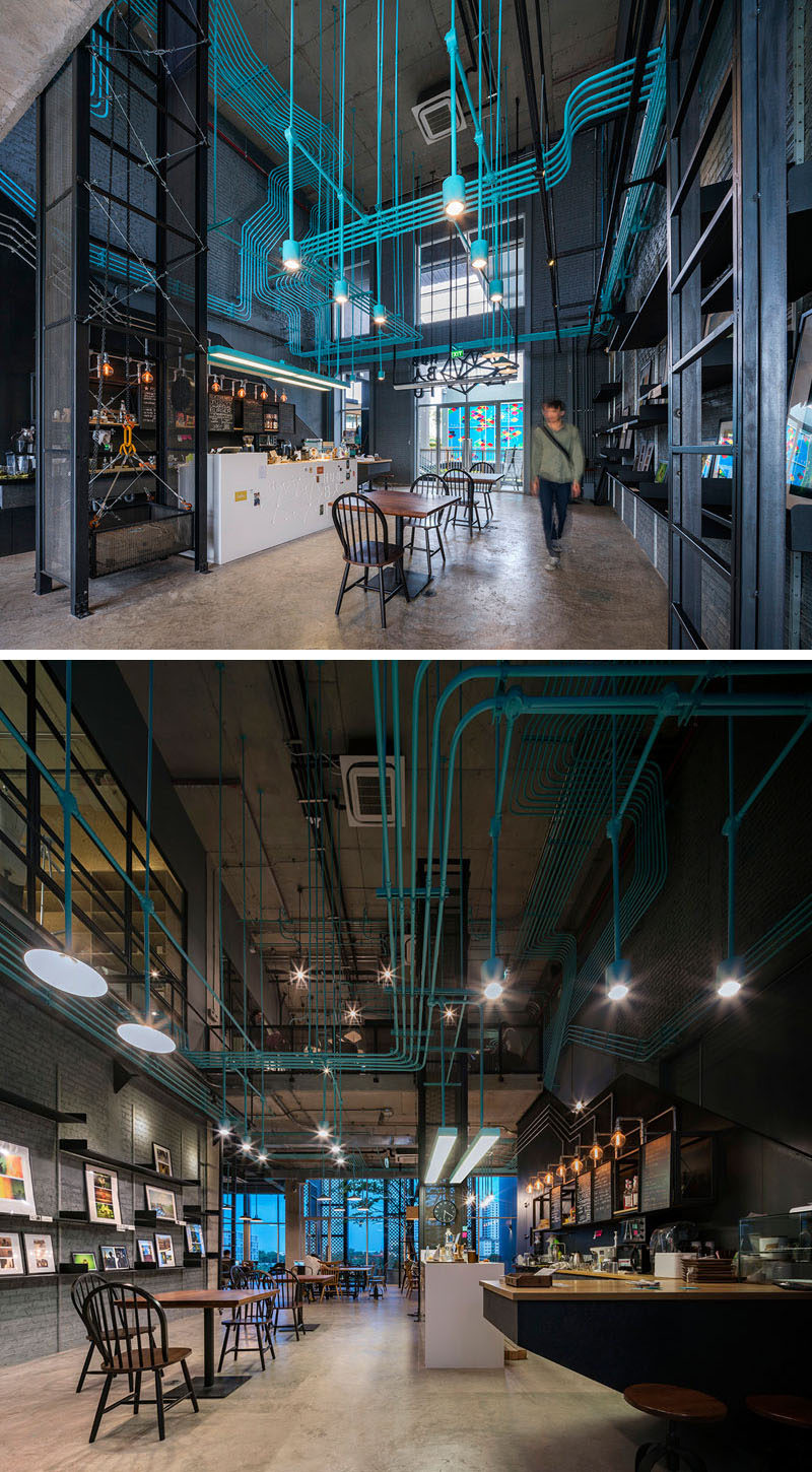 Interior Decor Idea - Turquoise electrical conduit is a design feature running through this co-working office space.