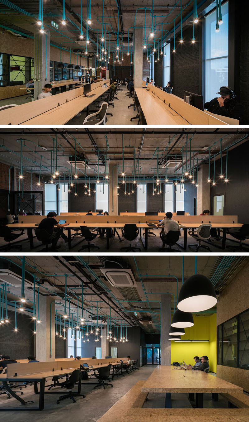 Interior Decor Idea - Turquoise electrical conduit is a design feature running through this co-working office space.