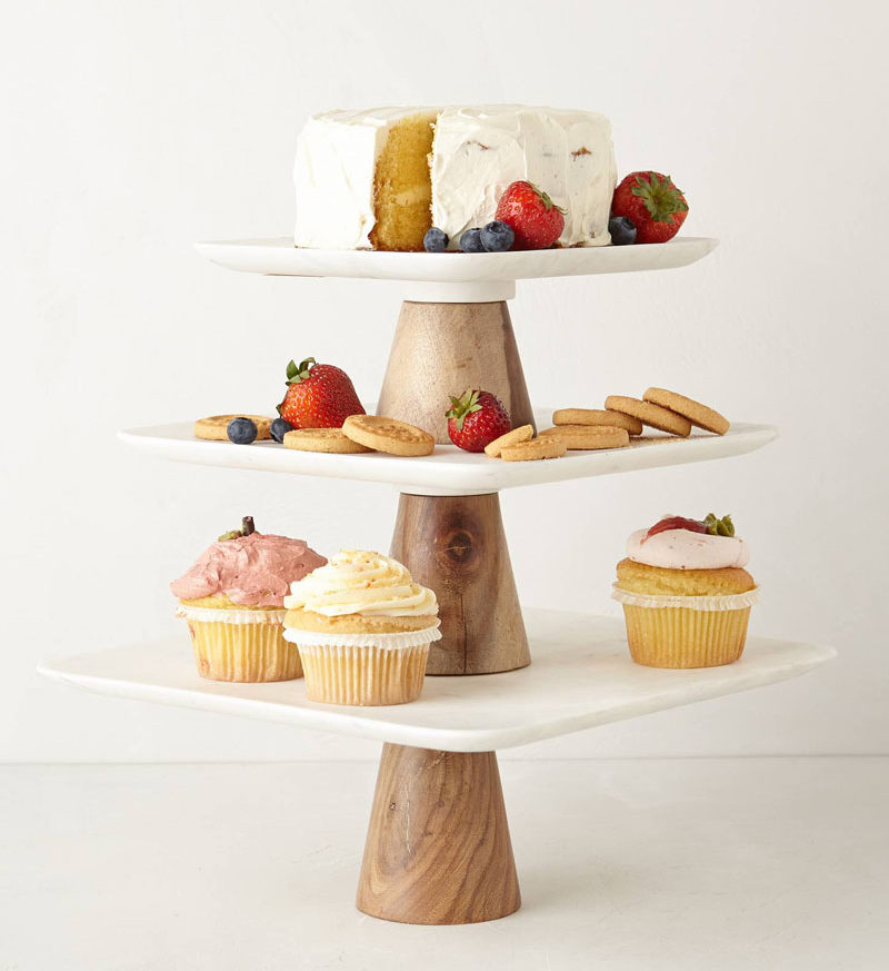 5 Essentials You Need When Hosting An Awesome Modern Tea Party // Serve your snacks on a modern tiered cake stand to make sure your guests can help themselves whenever they like without having to leave the table.