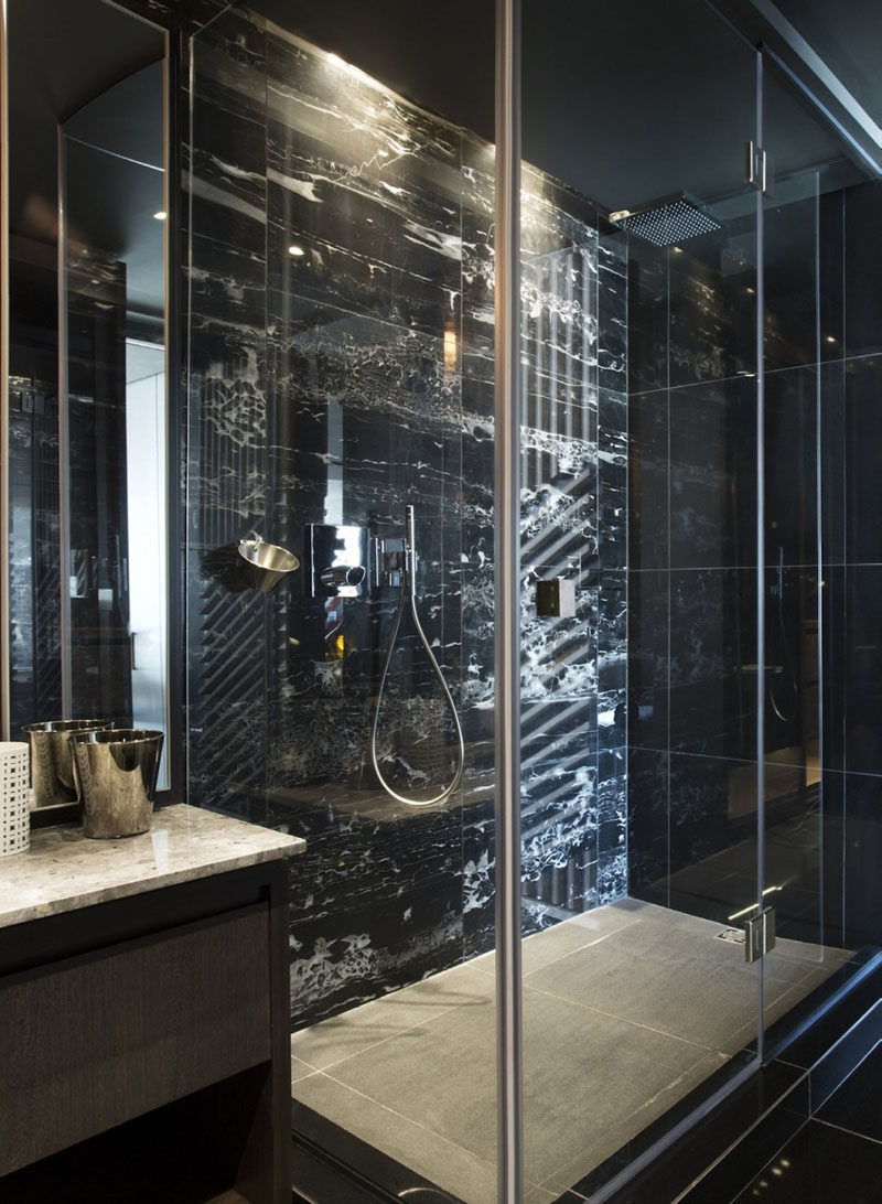 Bathroom Design Idea - 5 Ideas For Adding Marble To Your Bathroom // Shower Surround - This bathroom features black marble for a dramatic effect.