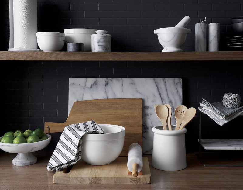 Kitchen Design Idea - How To Add Marble In Your Kitchen // Mixing bowls, utensil holders, and cutting boards all come in marble and, when they're used all together, make your kitchen feel put together and sophisticated.