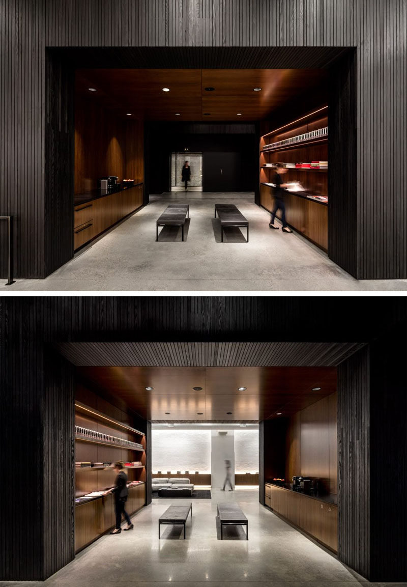 Hidden within a blackened wood wall in this New York office is a self-serve coffee area. 