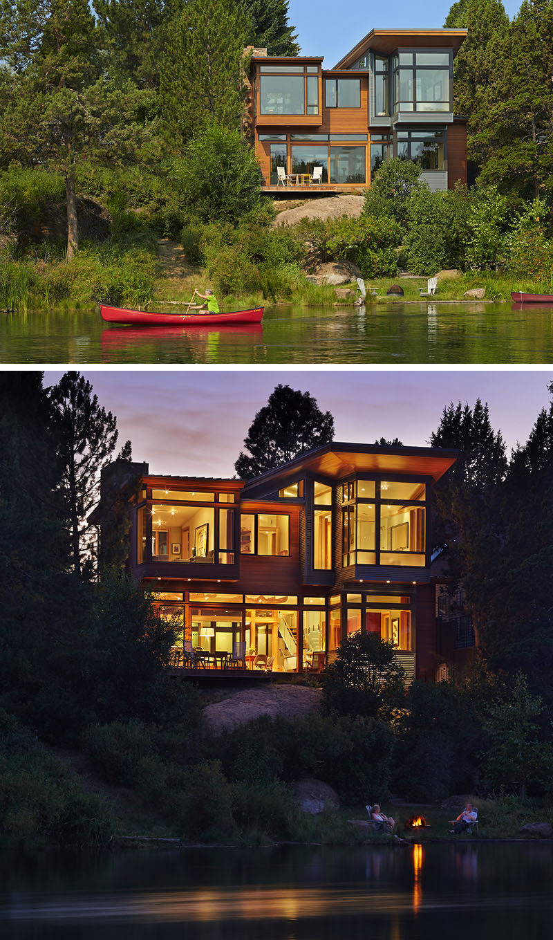 20 Awesome Examples Of Pacific Northwest Architecture // The large windows on this house appear rise up out of the trees and the rocks on the edge of a river in Oregon.