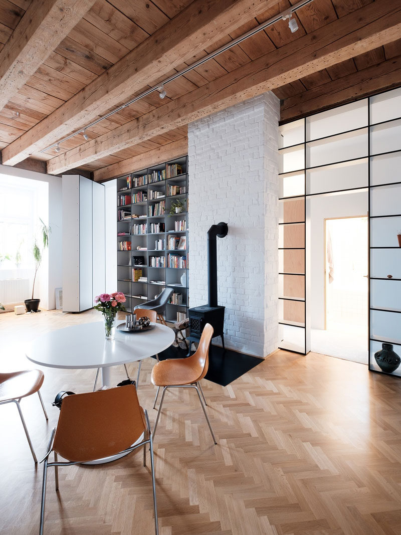 A bedroom hides behind this bookcase and is accessed through a secret door.