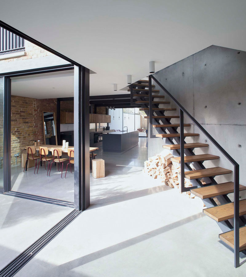 Stairs Design Idea - These wood and steel stairs seen in a renovated home, used upcycled timber from the original space for the stair treads, and the wood and steel keeps with the industrial look of the home.