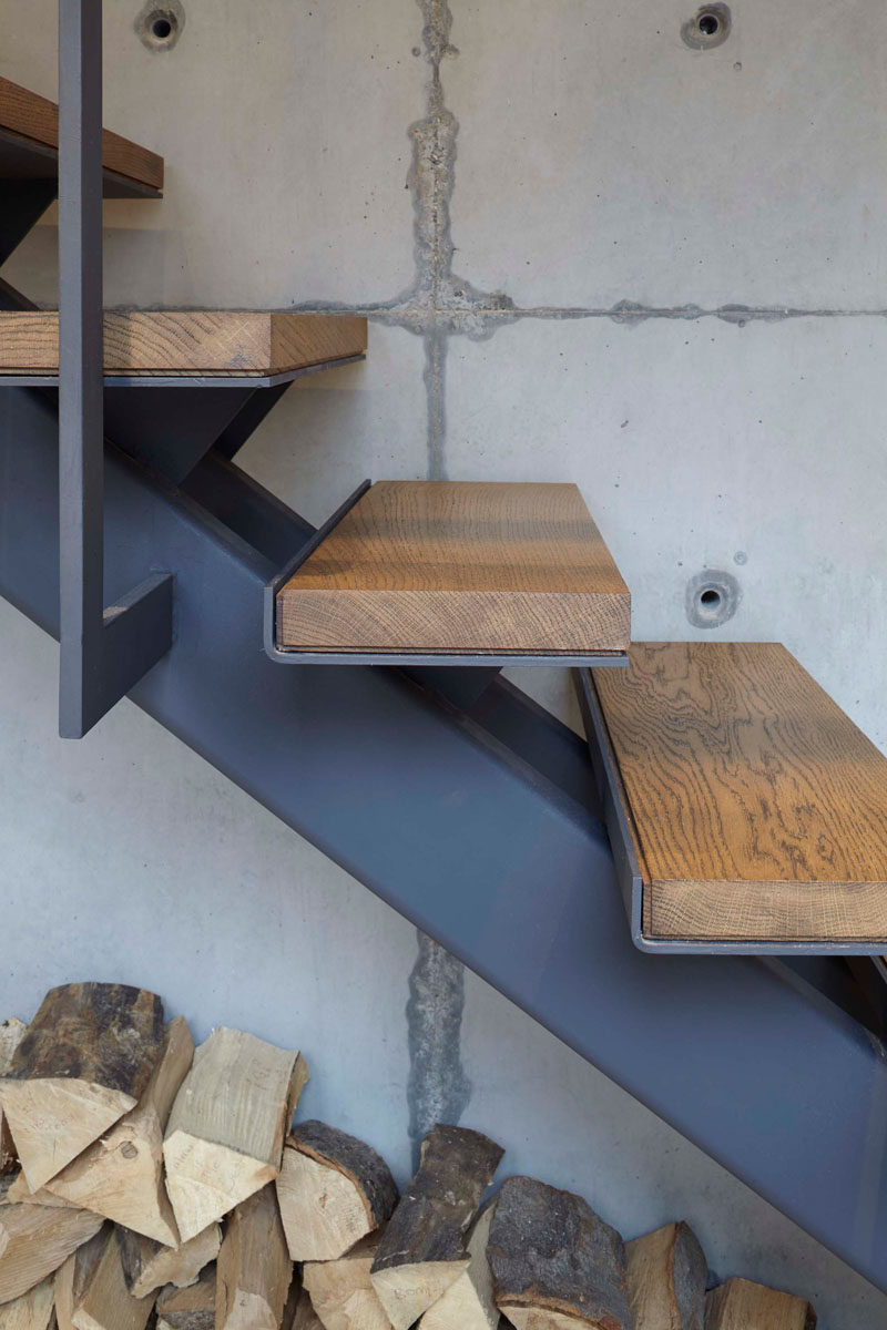 Stairs Design Idea - These wood and steel stairs seen in a renovated home, used upcycled timber from the original space for the stair treads, and the wood and steel keeps with the industrial look of the home.