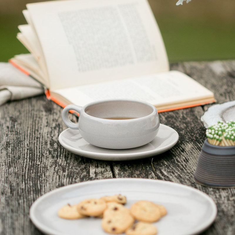 Gift Ideas For Tea Drinkers // Smooth curved lines and an earthy color palette make these cups and saucers a great choice for people who really like to relax while they sip their tea.