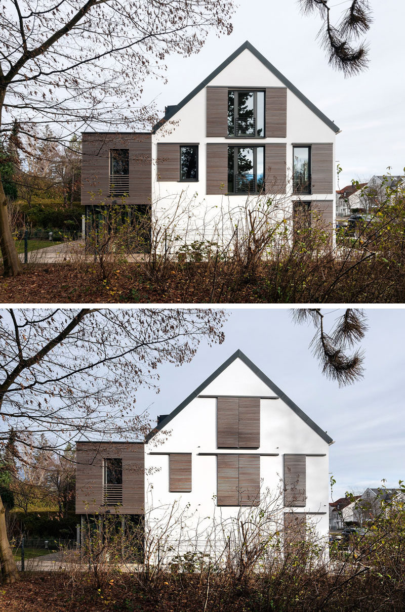 This house has sliding wood shutters to protect the windows from the elements.