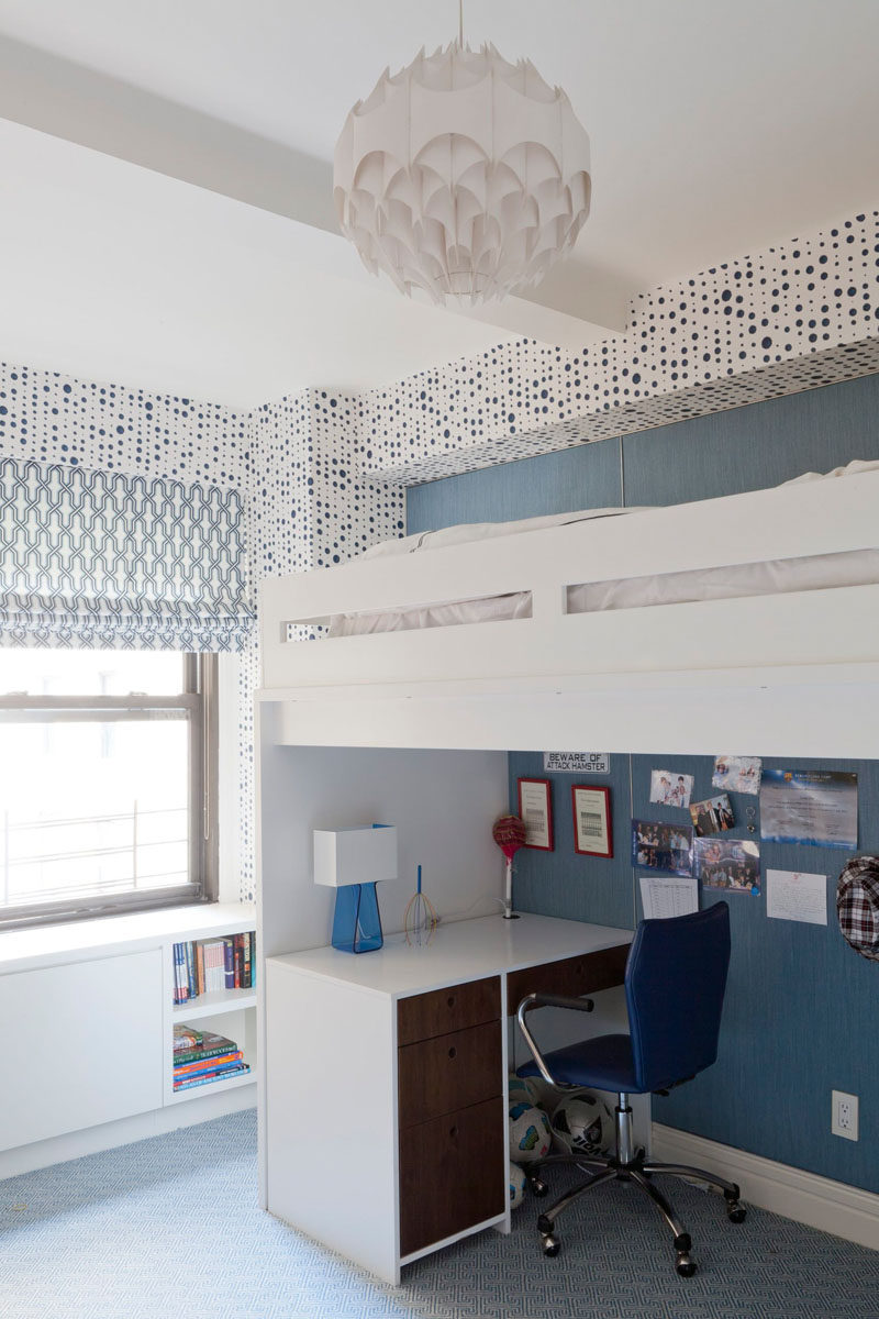 Patterned Roman blinds add a fun accent in this kid's bedroom.