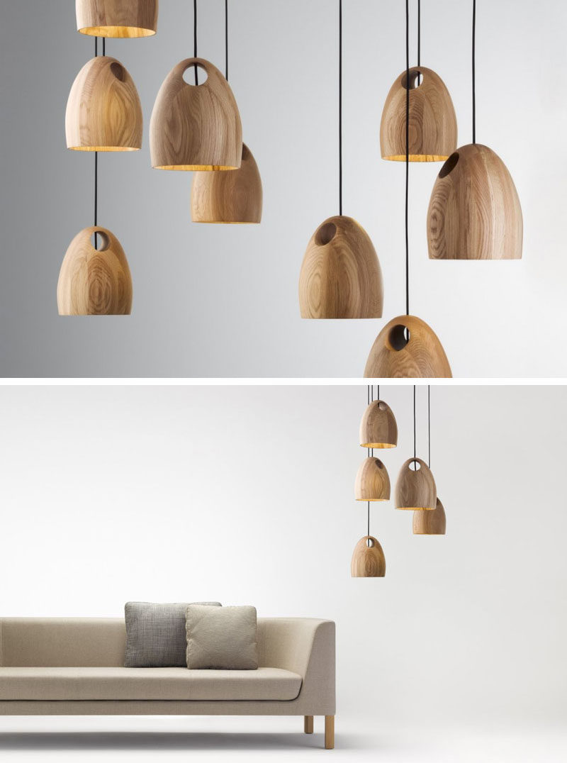 15 Wood Pendant Lights That Add A Natural Touch To Your Decor // These oak pendant lights that come in a number of finishes have a hole in the top of them to allow for multiple ways of hanging.