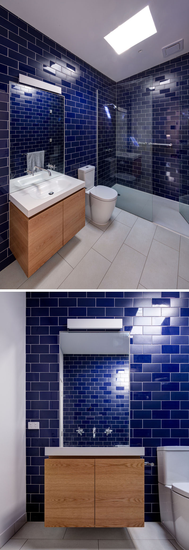 Dark blue tiles have been paired with white and wood in this contemporary bathroom.