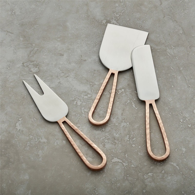 15 Host(ess) Gifts To Make You The Favorite Guest // As any host knows, you can never have too many cheese knives. A copper set is the perfect gift the host who loves their cheese and cracker combo.
