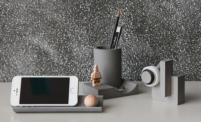 A concrete desk set with a pen holder, tape dispenser, and phone stand will help keep space clutter free and stylishly organized.  #GiftIdeas #Architect #InteriorDesigner #ModernGiftIdeas #DeskAccessories #ConcreteAccessories