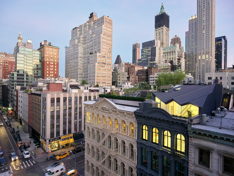 Architectural design firm WORKac, have completed the renovation of a historical building with a cast-iron facade in New York City, and transformed it into modern apartments.